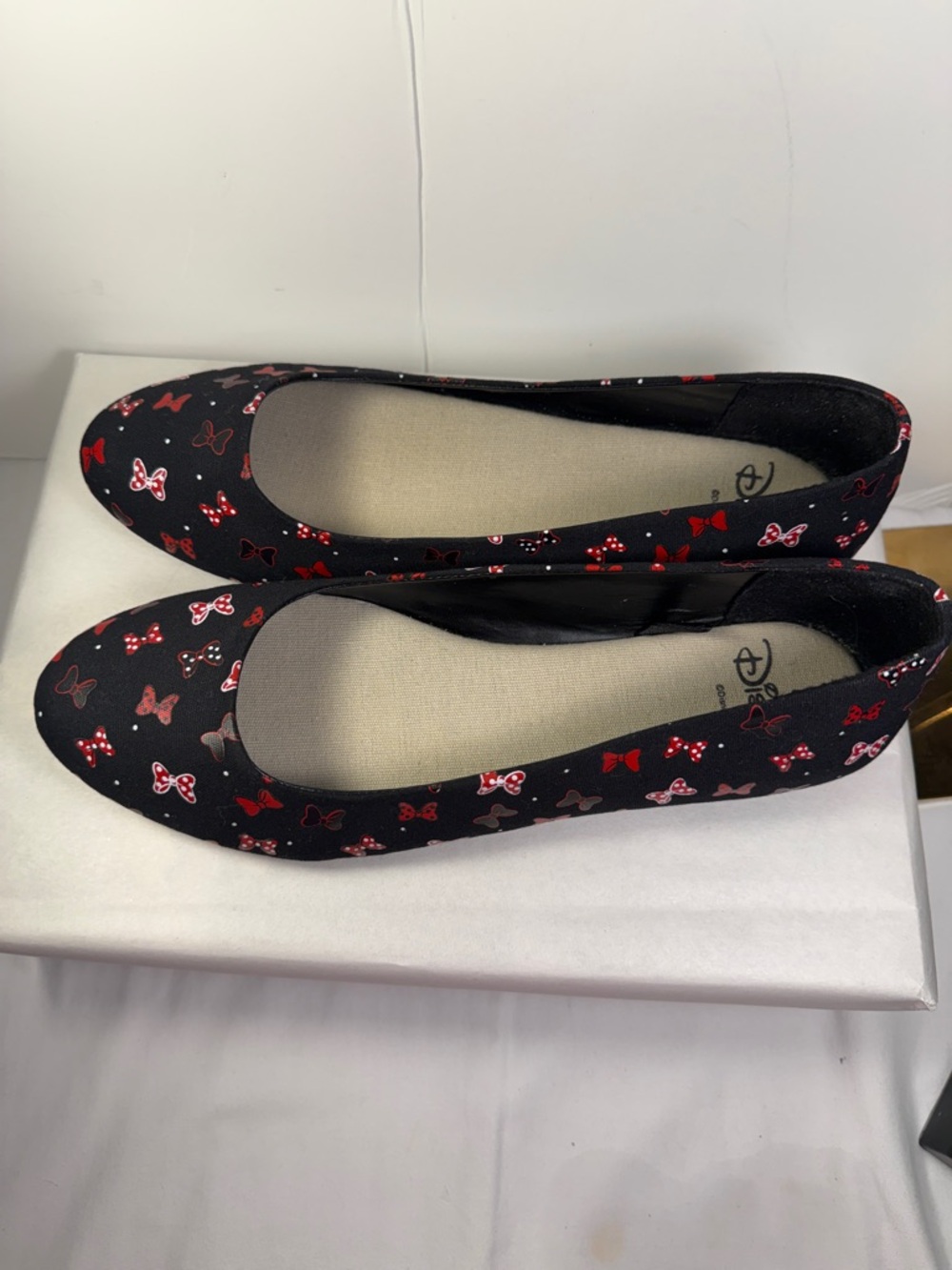 Disney Women’s Black Ballet Flats with Red Bow Print